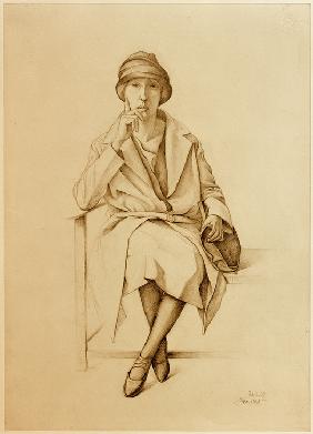 Sitzendes junges Mädchen in Mantel und Hut 1927