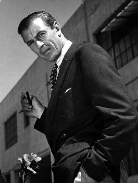 American Actor Gary Cooper smoking a pipe c. 1940