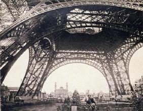 Under the Eiffel Tower, before ascending, from 'L'Album de l'Exposition 1889' by Glucq, Paris 1889 ( 1905