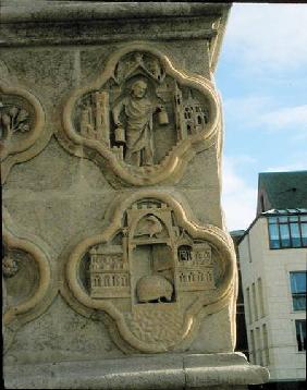 Two quatrefoils on the centre left buttress of the west front c.1220