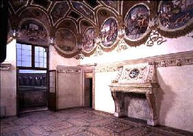 View of the Camera dei Venti, showing the stucco fireplace and frieze with zodiac roundels above 1528