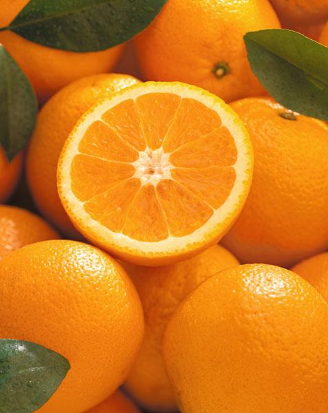 Oranges and cut orange, 1996 (colour photo)  1996